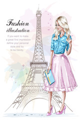 Fototapeta na wymiar Beautiful blonde hair girl with hand bag. Fashion woman with eiffel tower on background. Hand drawn young woman in fashion clothes. Sketch. Vector illustration.