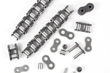 details of industrial driving roller chain on white background