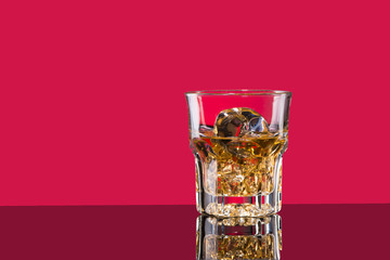 Glass of scotch whiskey and ice