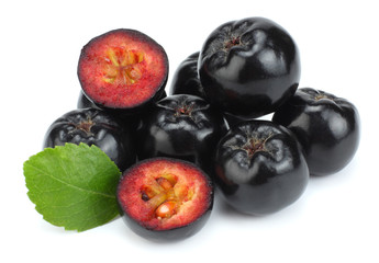 Chokeberry with leaf isolated on white background. Black aronia.