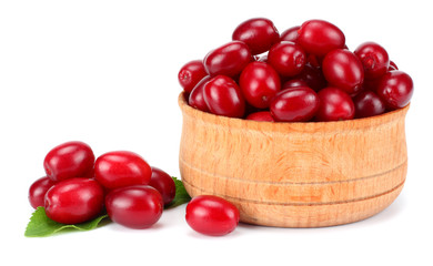 dogwood berries in wooden bowl isolated on white background