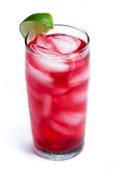 red cocktail with a lime