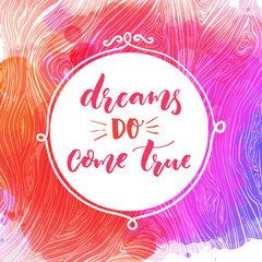 Dreams do come true. Motivational quote, hand lettering quote on pink and purple watercolor background