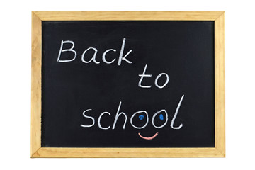 Obraz premium Back to school text on school blackboard