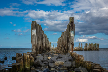 Wooden breakwaters line at Baltic Sea in Babie Doly, Gdynia, Poland