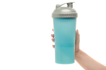 Obraz premium Blue sport shaker female hand