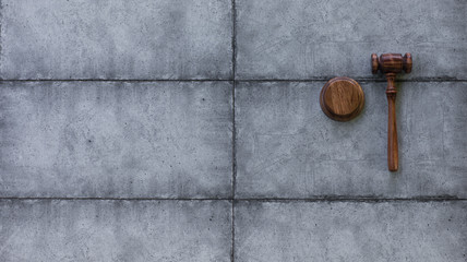 Judicial wooden mallet on the tile