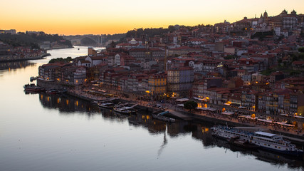 Fototapeta na wymiar Douro river and Ribeira from Dom Luis I bridge at night time, Porto, Portugal.