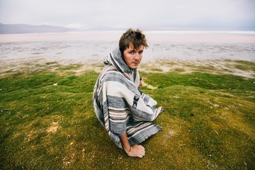 Boy in Uyuni salt flats view