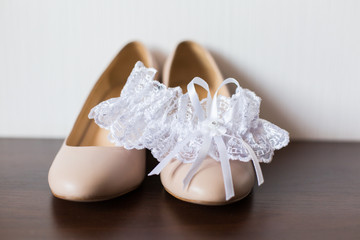 Wedding accessories: Bride's garter and shoes