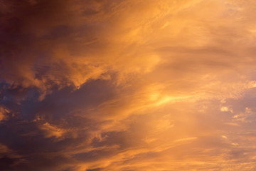 Naklejka na ściany i meble Beautiful clouds at sunset, improbable sky