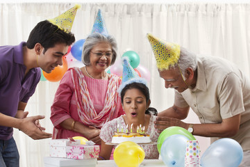 Family celebrating birthday