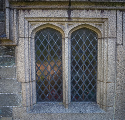 Church Windows in Tavistock UK. Tavistock is the main town of Dartmoor's western moor. It is an exceptionally attractive town owing as much to some fine Victorian architecture