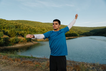 Motivated athlete doing warmups before the real workout