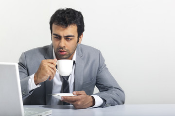 Businessman with a cup of coffee 