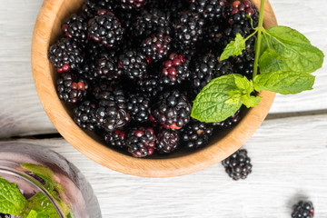 Wooden cup with Blackberries