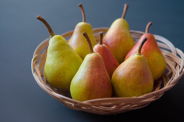 Pears. Pears harvest. Fruit background. Fresh organic pears on old sacking. Pear autumn harvest. Juicy flavorful pears of rustic background. Free space for text. Autumn nature concept.
