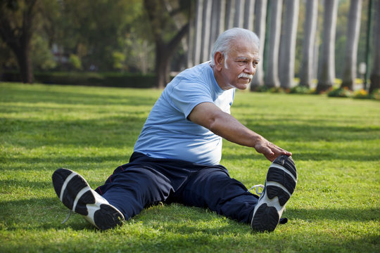Full length of man exercising in park 