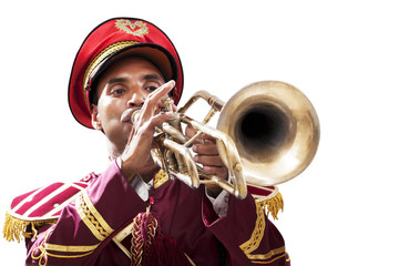Bandwala playing on a trumpet