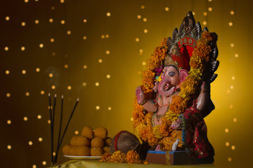 Ganesh idol and laddus