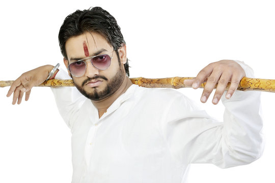 Portrait of a man with a stick 