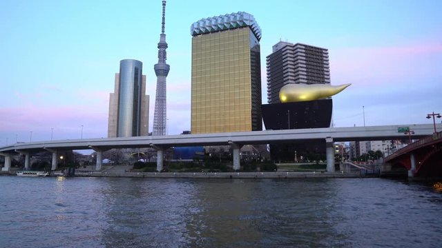 4k cinematic b-roll footage of sunset blue hour scene at Tokyo city skyline and Sumida River Bridge.