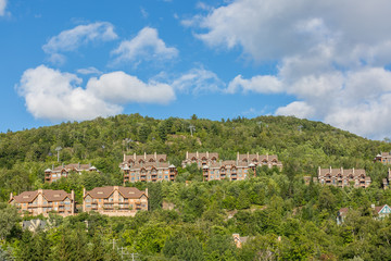 Fototapeta na wymiar Houses in a mountain with a blue sky 