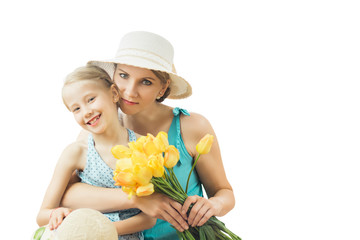 The woman in the blue dress with her daughter isolated on a white background.