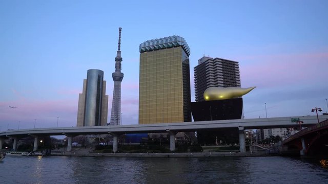 4k cinematic b-roll footage of sunset blue hour scene at Tokyo city skyline and Sumida River Bridge.