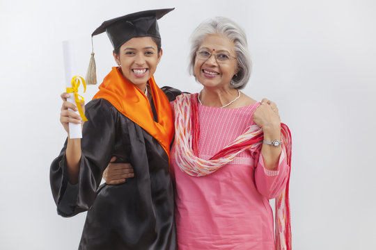 Woman at granddaughter's graduation ceremony