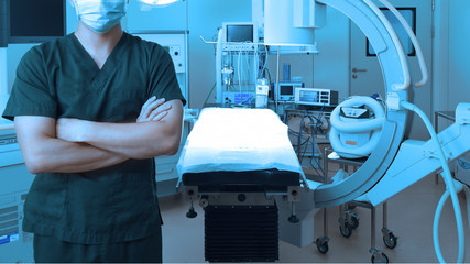 veterinarian surgeons in operating room take with art lighting and blue filter