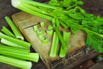 Fresh green celery isolated on white background