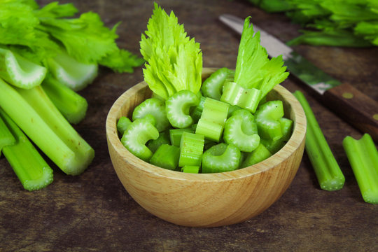 Fresh green celery isolated on white background