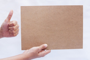 Hand Holding Blank Wooden Board Over White Backgroud