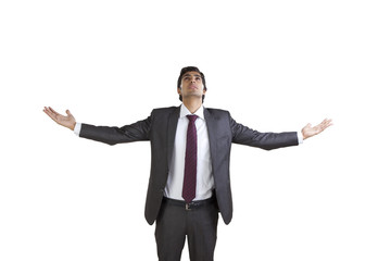 Business executive enjoying with arms outstretched