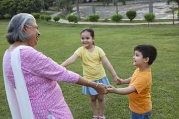 Grandmother playing with grandchildren