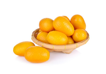 fresh kumquat orange in bamboo basket and on white background