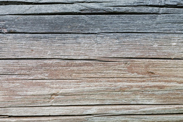 Old wooden wall fragment closeup shot, abstract texture