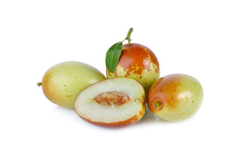 whole and half cut fresh Chinese Jujube on white background