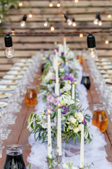 Glasses on the festive table setting. Wedding table decor concept. Table setting in classic style, setout. fine art.