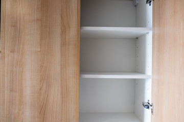 Empty open wooden shelf