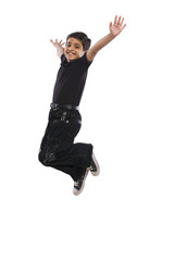 Boy jumping in the air 