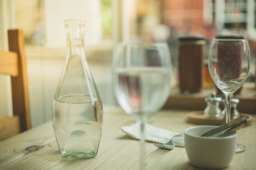 Table setting with glasses and water
