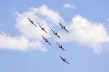 planes in the sky performing aerobatic figure