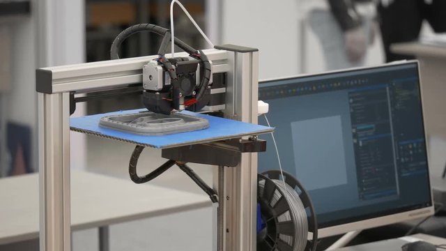 Industrial 3D Printing.The printer prints a 3D prototype parts modeled on the computer. Layer-by-layer to create the sample of composite material.