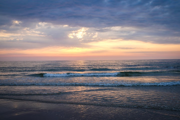 Fototapeta na wymiar Sunset over the north sea beach at island sylt