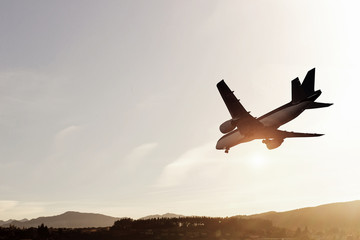 Airliner in sky. Mixed media