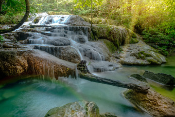 Amazing beautiful deep forest waterfall in Erawan National Park, Kanchanaburi, Thailand