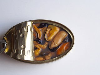 Natural mussels canned on white background