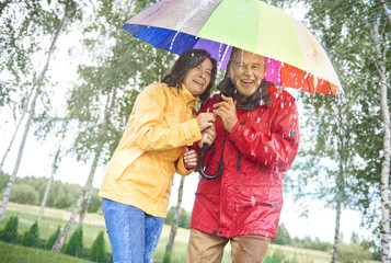 Couple with a rainbow umbrella